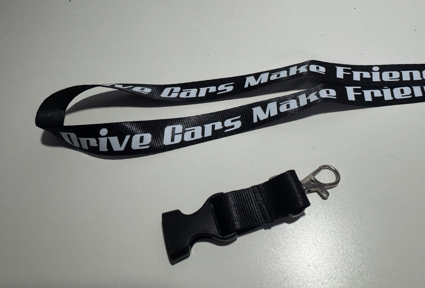 Be OK Garage “Drive Cars, Make Friends, Be OK” Lanyard